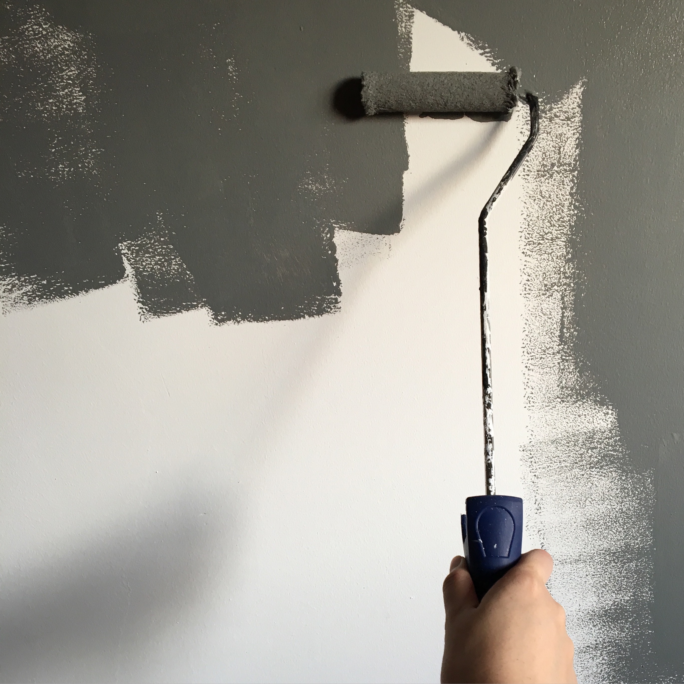 Painting walls with dark gray paint